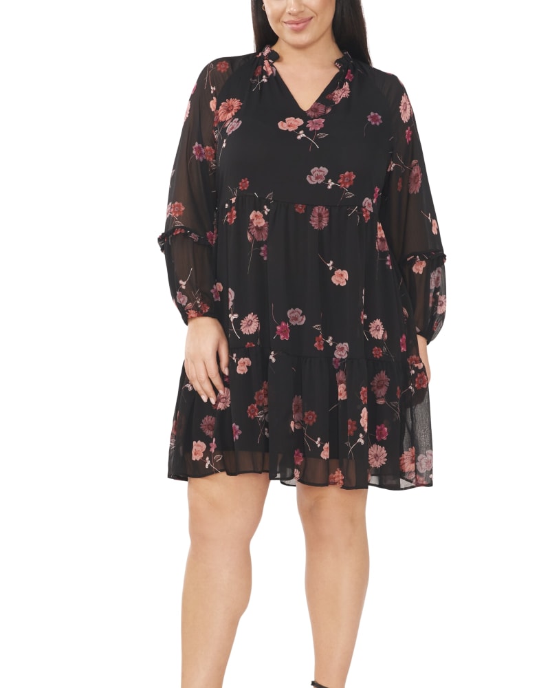 Front of a model wearing a size 1X Isabella Printed Babydoll Dress in RICH BLACK by CeCe. | dia_product_style_image_id:263395